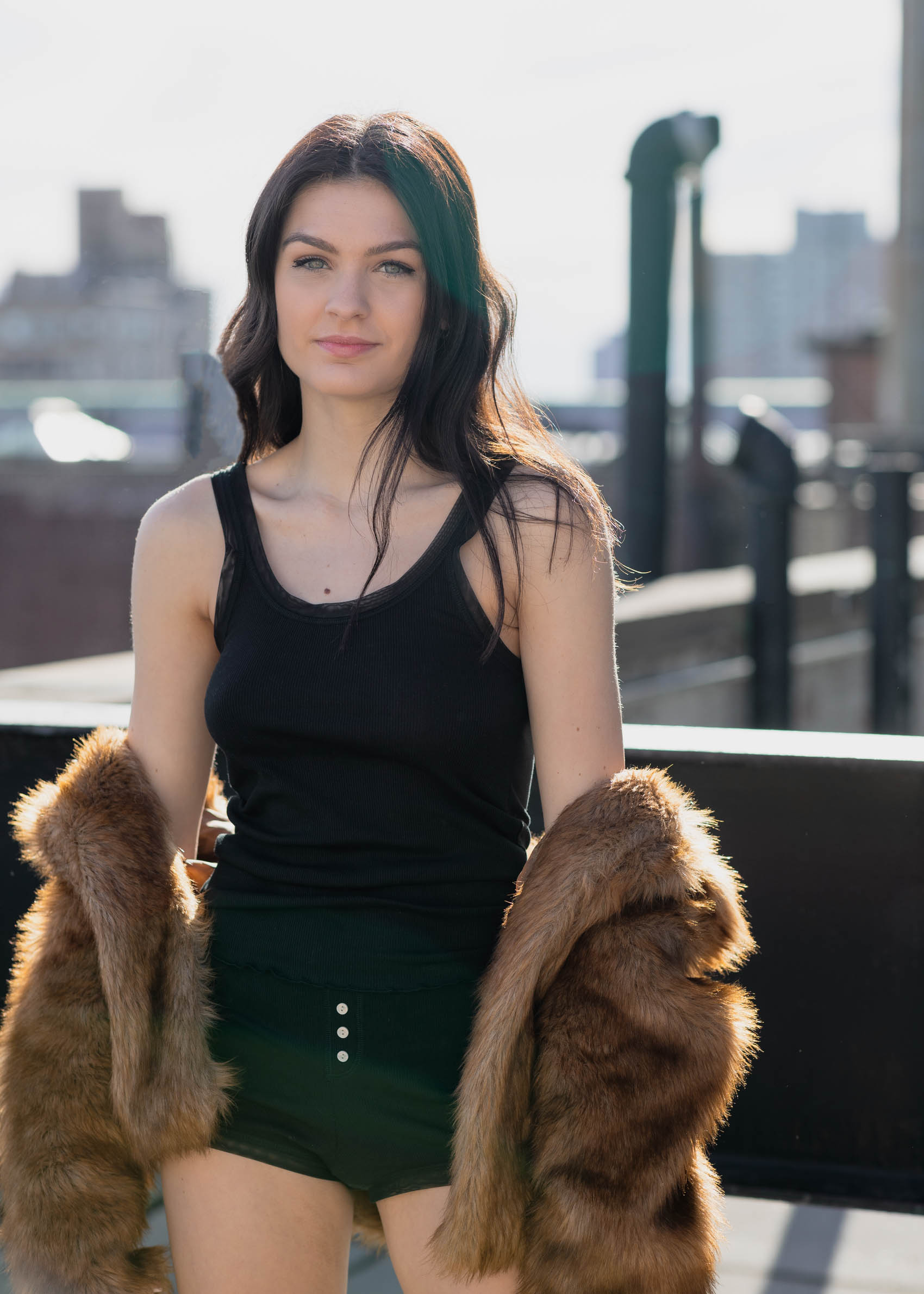 Portrait of a model on a roof in New York City - Sharon Schuur Photography