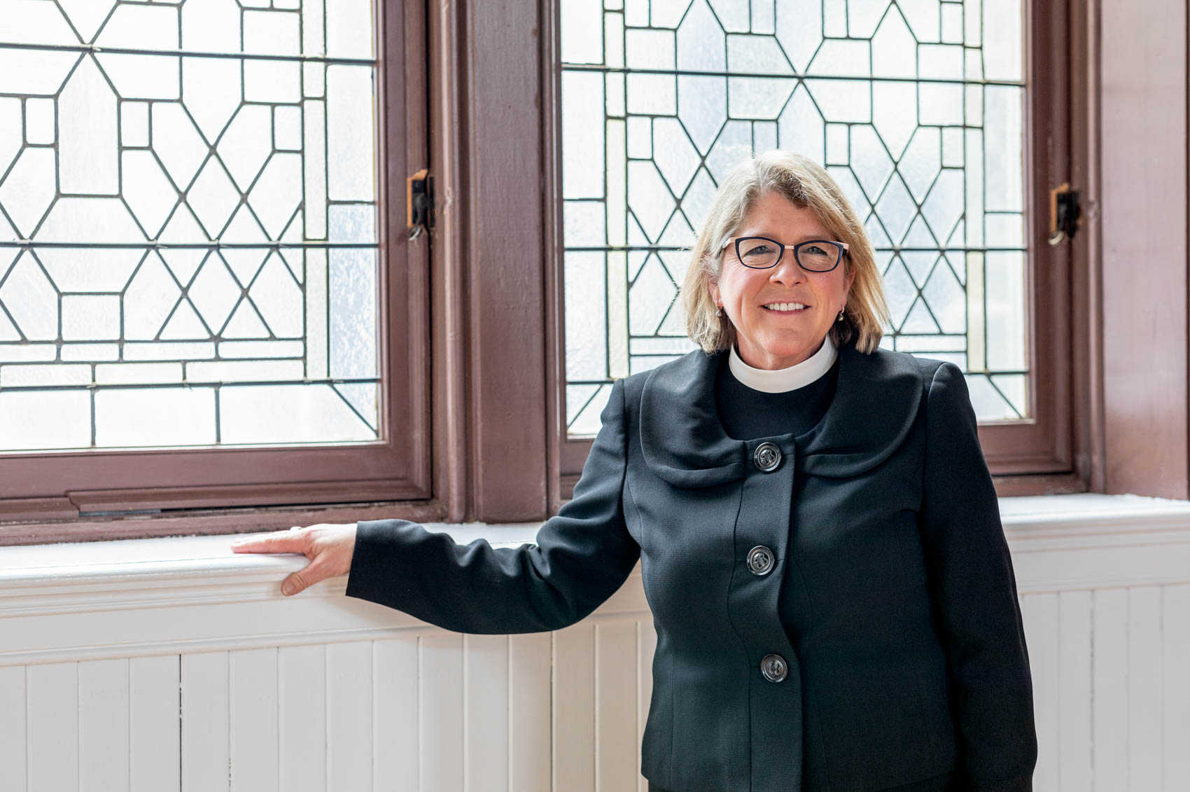 Portrait of a woman priest on location - Sharon Schuur Photography